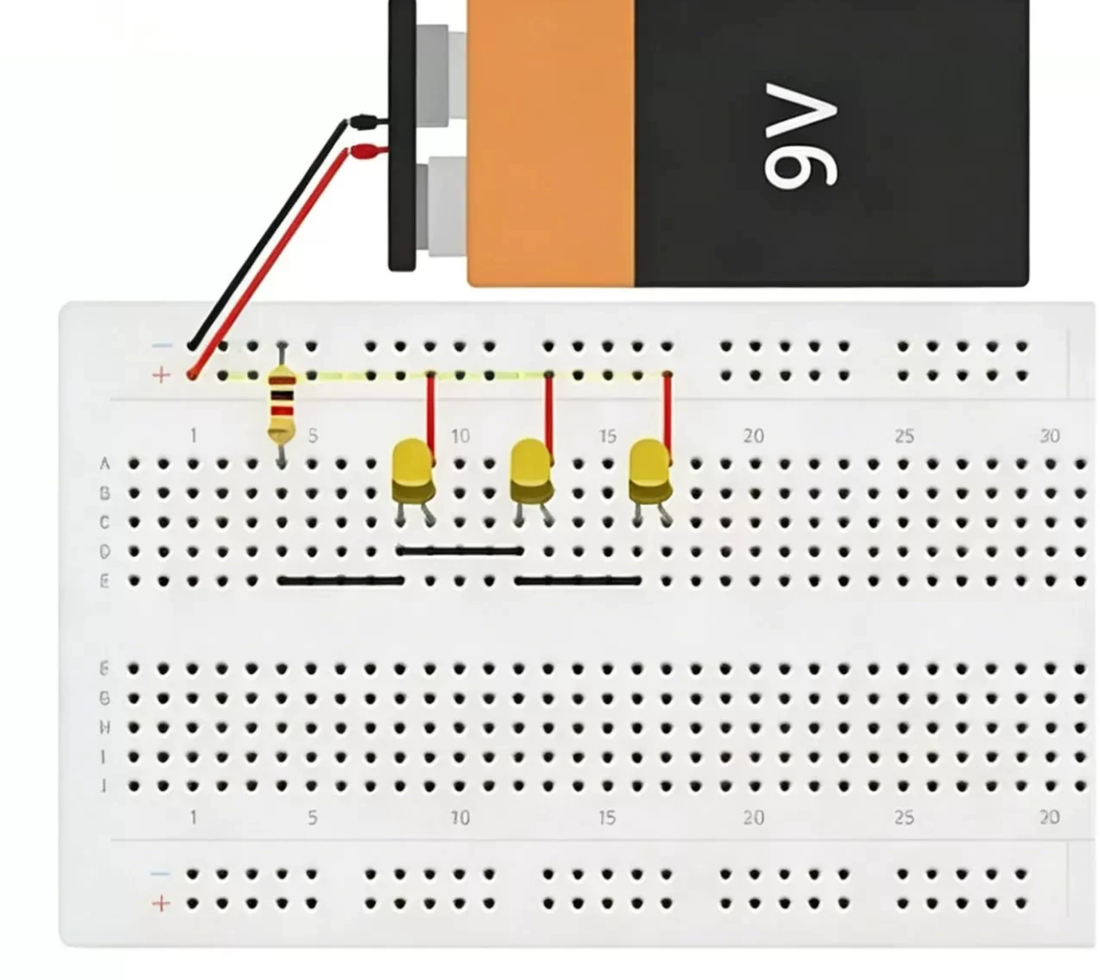 串联：电阻与 LED 在面包板上的接法示意